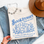 Booktrovert Comfort Colors T-shirt featuring a playful book lover graphic on a relaxed garment-dyed 100% cotton tee for readers and bookworms in color Ivory