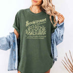 Booktrovert Comfort Colors T-shirt featuring a playful book lover graphic on a relaxed garment-dyed 100% cotton tee for readers and bookworms in color Moss