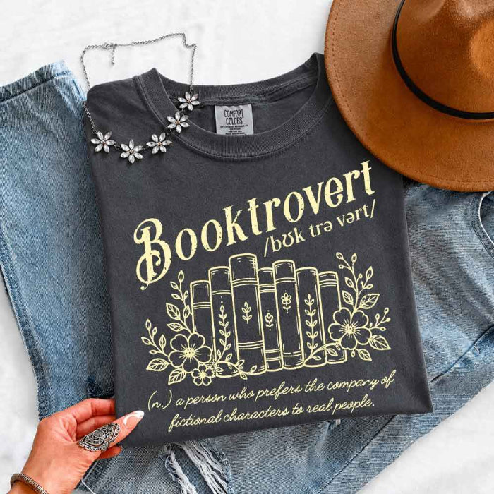 Booktrovert Comfort Colors T-shirt featuring a playful book lover graphic on a relaxed garment-dyed 100% cotton tee for readers and bookworms in color Pepper