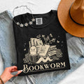 Bookworm Comfort Colors graphic T-shirt featuring a book lover design on a relaxed garment-dyed tee for readers and bookworms in Black