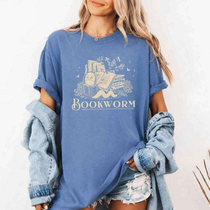 Bookworm Comfort Colors graphic T-shirt featuring a book lover design on a relaxed garment-dyed tee for readers and bookworms in Blue Jean