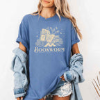 Bookworm Comfort Colors graphic T-shirt featuring a book lover design on a relaxed garment-dyed tee for readers and bookworms in Blue Jean
