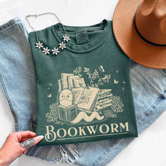 Bookworm Comfort Colors graphic T-shirt featuring a book lover design on a relaxed garment-dyed tee for readers and bookworms in Blue Spruce