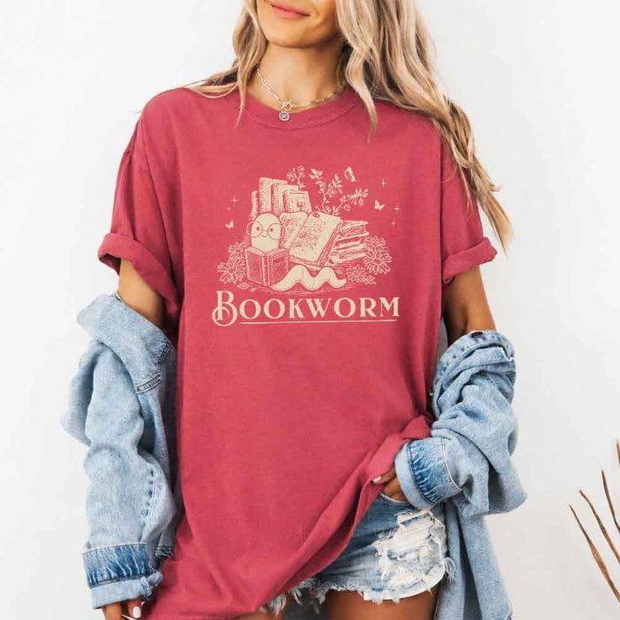 Bookworm Comfort Colors graphic T-shirt featuring a book lover design on a relaxed garment-dyed tee for readers and bookworms in Crimson