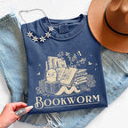 Bookworm Comfort Colors graphic T-shirt featuring a book lover design on a relaxed garment-dyed tee for readers and bookworms in Denim
