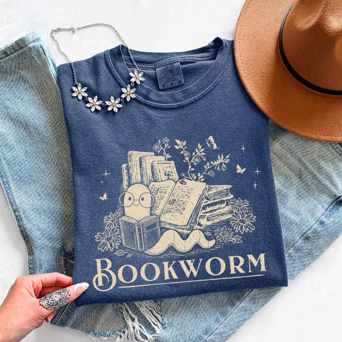 Bookworm Comfort Colors graphic T-shirt featuring a book lover design on a relaxed garment-dyed tee for readers and bookworms in Denim