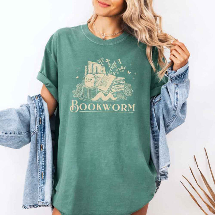 Bookworm Comfort Colors graphic T-shirt featuring a book lover design on a relaxed garment-dyed tee for readers and bookworms in Light Green
