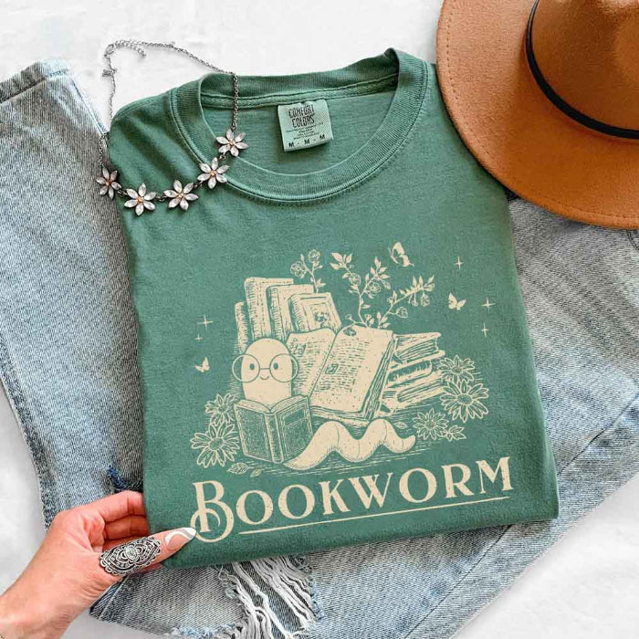 Bookworm Comfort Colors graphic T-shirt featuring a book lover design on a relaxed garment-dyed tee for readers and bookworms in Light Green