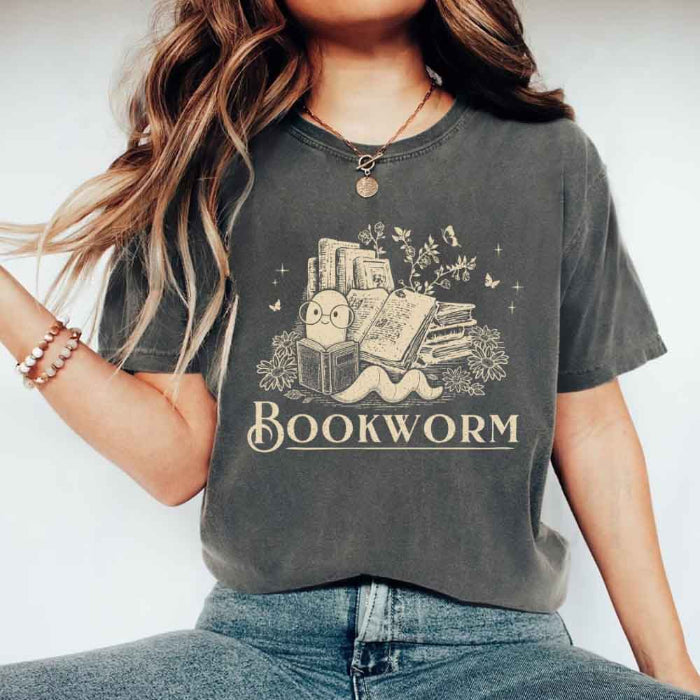 Bookworm Comfort Colors graphic T-shirt featuring a book lover design on a relaxed garment-dyed tee for readers and bookworms in Pepper