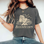 Bookworm Comfort Colors graphic T-shirt featuring a book lover design on a relaxed garment-dyed tee for readers and bookworms in Pepper