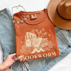 Bookworm Comfort Colors graphic T-shirt featuring a book lover design on a relaxed garment-dyed tee for readers and bookworms in Yam
