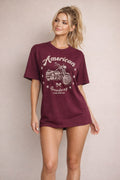 Women's maroon motorcycle graphic tee with boxy silhouette, crew neckline, and short sleeves