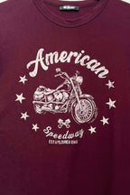 Women's maroon motorcycle graphic tee with boxy silhouette, crew neckline, and short sleeves