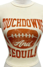 Touchdowns and Tequila graphic crop tee in white/cream with football-inspired game day design