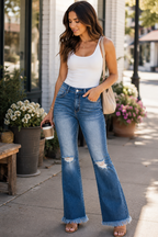 Audrey is wearing Bytos Raw Hem Distressed Bootcut Jeans – High Rise Stretch Denim