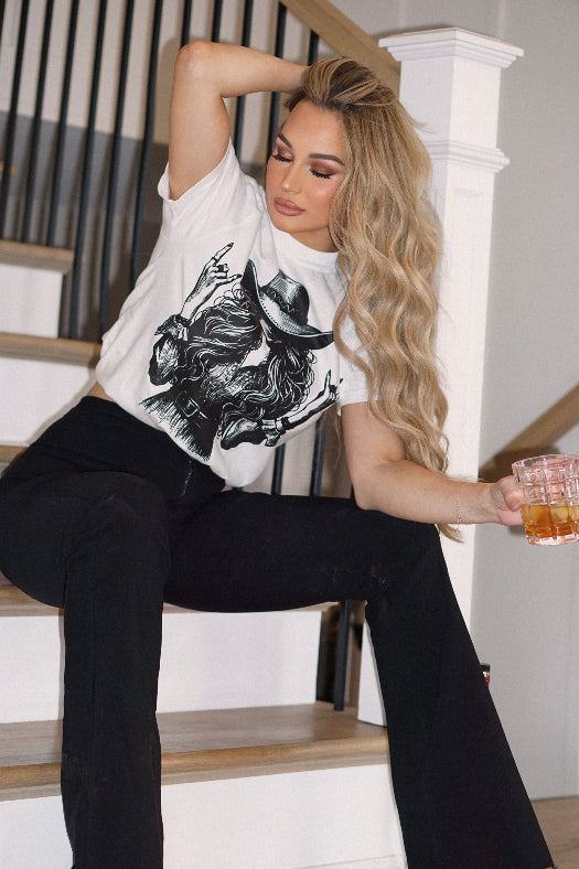 Women’s Lainey Cool Cowgirl graphic tee featuring an original Willow Boutique Western design on a relaxed-fit Comfort Colors® 100% cotton T-shirt.