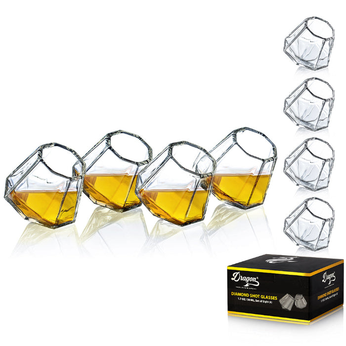 Set of clear diamond-shaped 2 oz shot glasses by Dragon Glassware featuring a unique geometric design that rests at a tilted angle.