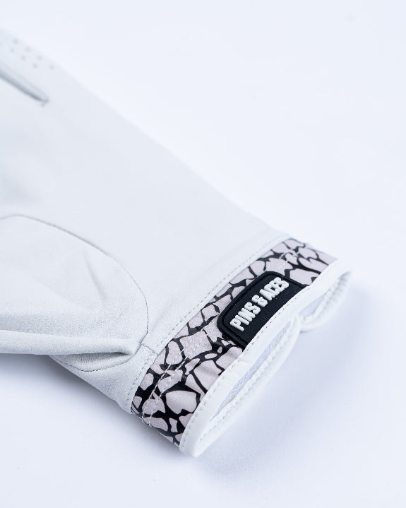 Pins & Aces Premium Tour men’s golf glove featuring an elephant print design and 100% premium AAA Cabretta leather construction.