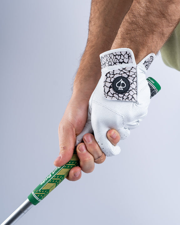 Pins & Aces Premium Tour men’s golf glove featuring an elephant print design and 100% premium AAA Cabretta leather construction.