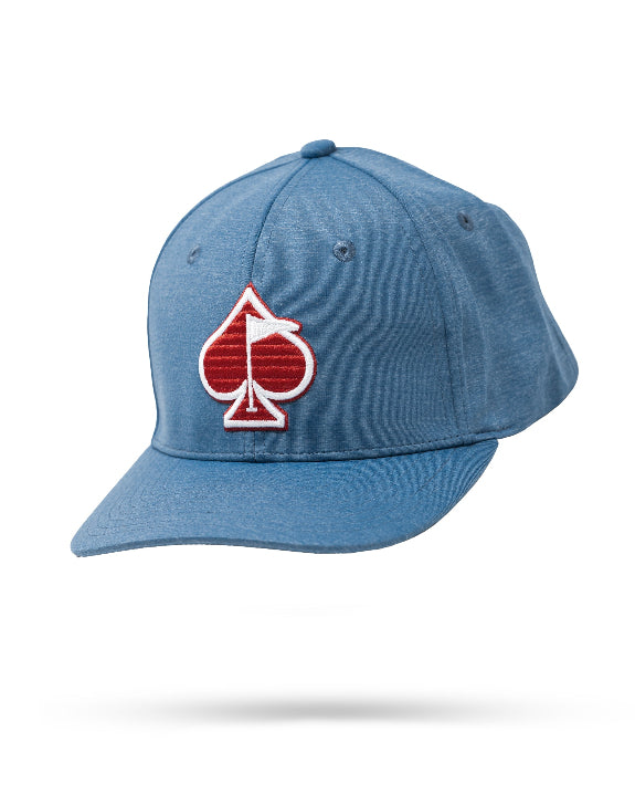 Blue Performance Spade golf hat by Pins & Aces featuring an embroidered Fairway Wave Spade logo, adjustable snapback, curved bill, and built-in magnetic golf ball marker holder.
