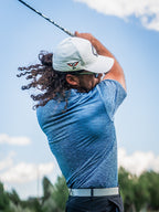 Men’s Squiggle Blue performance golf polo by Pins & Aces featuring a subtle textured blue pattern, short sleeves, and athletic fit.