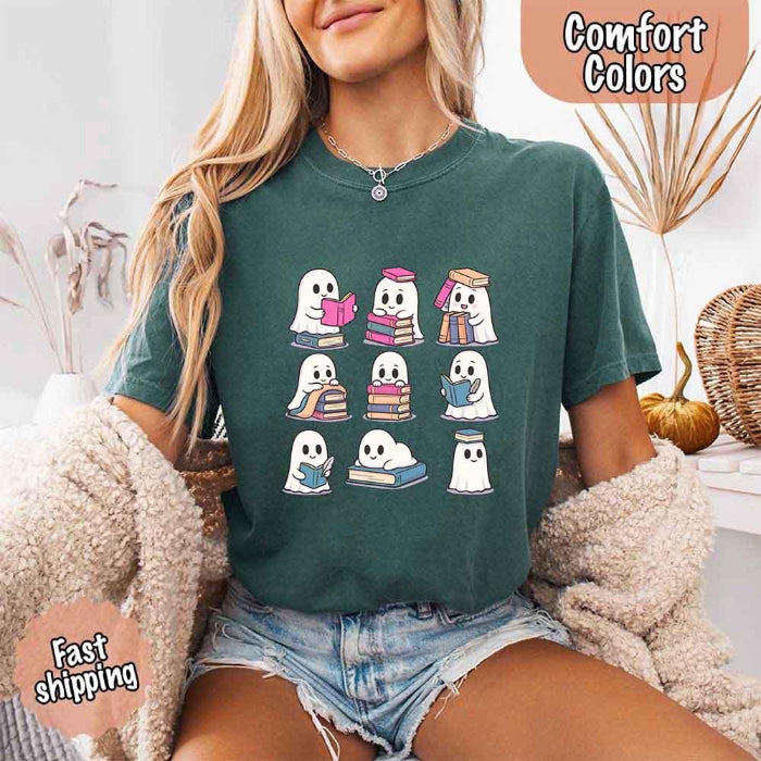 Ghost Reading Comfort Colors T-shirt featuring a whimsical ghost reading a book on a relaxed garment-dyed cotton Halloween graphic tee for book lovers in Blue Spruce