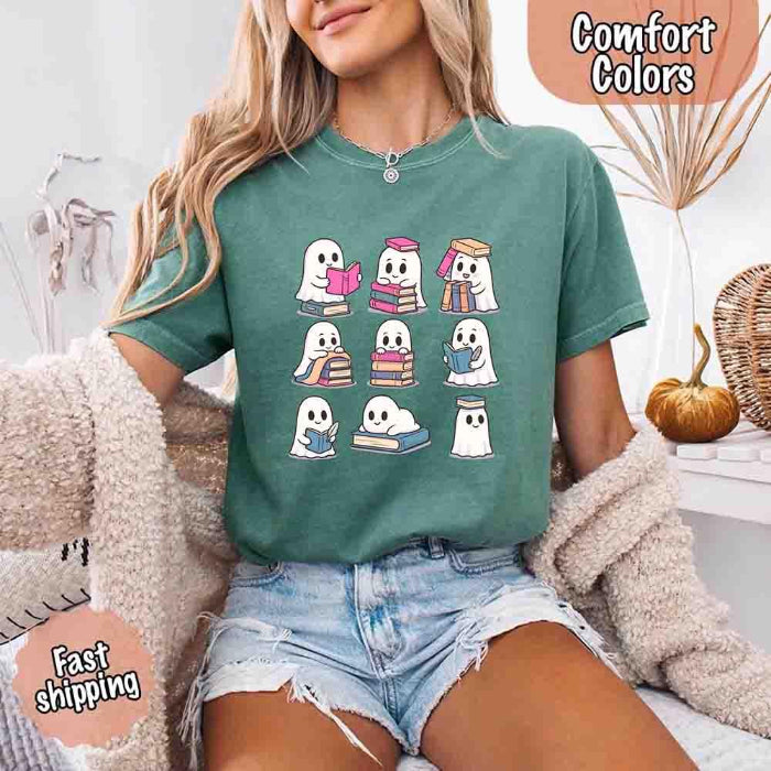 Ghost Reading Comfort Colors T-shirt featuring a whimsical ghost reading a book on a relaxed garment-dyed cotton Halloween graphic tee for book lovers in Light Green