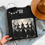 Girls Will Be Girls Comfort Colors graphic T-shirt with a playful Halloween-inspired design for spooky season in Black