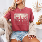 Girls Will Be Girls Comfort Colors graphic T-shirt with a playful Halloween-inspired design for spooky season in Crimson