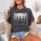 Girls Will Be Girls Comfort Colors graphic T-shirt with a playful Halloween-inspired design for spooky season in Pepper