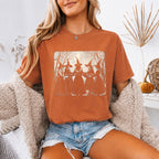 Girls Will Be Girls Comfort Colors graphic T-shirt with a playful Halloween-inspired design for spooky season in Yam