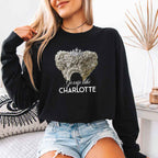 Gossip Like Charlotte Comfort Colors long sleeve shirt featuring a historical fiction and Regency-inspired literary graphic on a relaxed garment-dyed cotton tee in Black