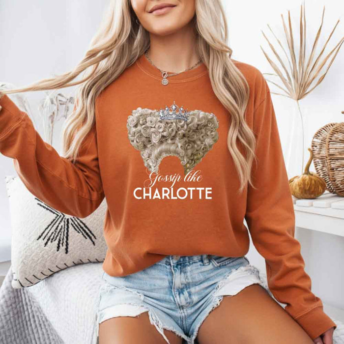 Gossip Like Charlotte Comfort Colors long sleeve shirt featuring a historical fiction and Regency-inspired literary graphic on a relaxed garment-dyed cotton tee in Yam