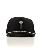 Thor’s Hammer Black perforated rope golf hat by Pins & Aces featuring a hammer-inspired design, adjustable snapback, breathable perforations, and built-in magnetic ball marker holder.