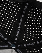 Thor’s Hammer Black perforated rope golf hat by Pins & Aces featuring a hammer-inspired design, adjustable snapback, breathable perforations, and built-in magnetic ball marker holder.
