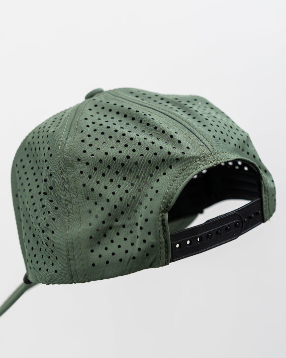 Olive green perforated rope golf hat by Pins & Aces featuring an embroidered Fairway Wave Spade logo, rope accent, adjustable snapback, and built-in magnetic golf ball marker holder.