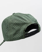 Olive green perforated rope golf hat by Pins & Aces featuring an embroidered Fairway Wave Spade logo, rope accent, adjustable snapback, and built-in magnetic golf ball marker holder.
