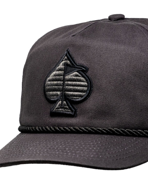 Heritage Charcoal rope golf hat by Pins & Aces featuring a low-profile 5-panel design, classic rope accent, adjustable snapback, and built-in magnetic golf ball marker holder.