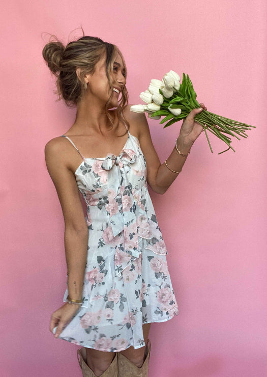 High School Sweetheart Mini Dress featuring a flattering sweetheart neckline, feminine tiered skirt, back zipper closure, and lightweight fabric, perfect for weddings, bridal showers, vacations, and spring or summer occasions. Color is Light Blue