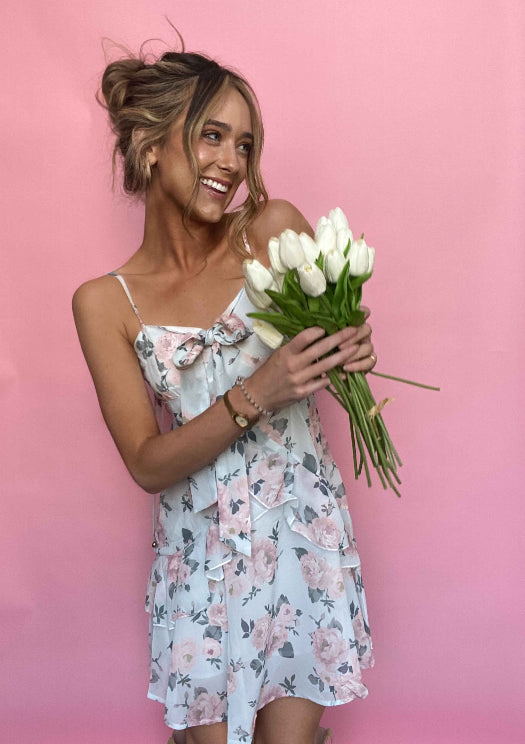 High School Sweetheart Mini Dress featuring a flattering sweetheart neckline, feminine tiered skirt, back zipper closure, and lightweight fabric, perfect for weddings, bridal showers, vacations, and spring or summer occasions. Color is Light Blue