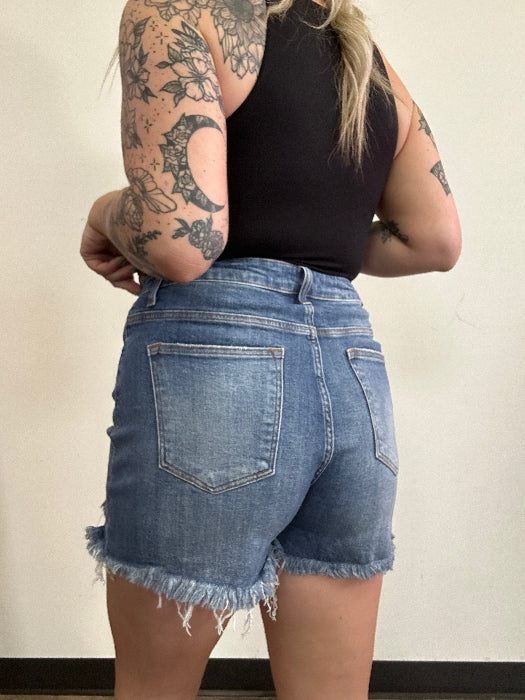 On The Go Medium Wash Distressed Shorts – High Rise