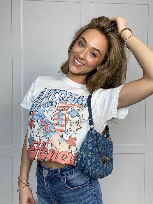 American Honey Graphic Tee printed on premium Comfort Colors 100% cotton featuring an exclusive Willow Boutique western-inspired design, perfect for country concerts, Nashville trips, rodeos, and everyday country style. Tshirt in White