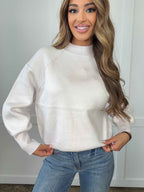 Amelia Mock Neck Exposed Seam Sweater in Off White