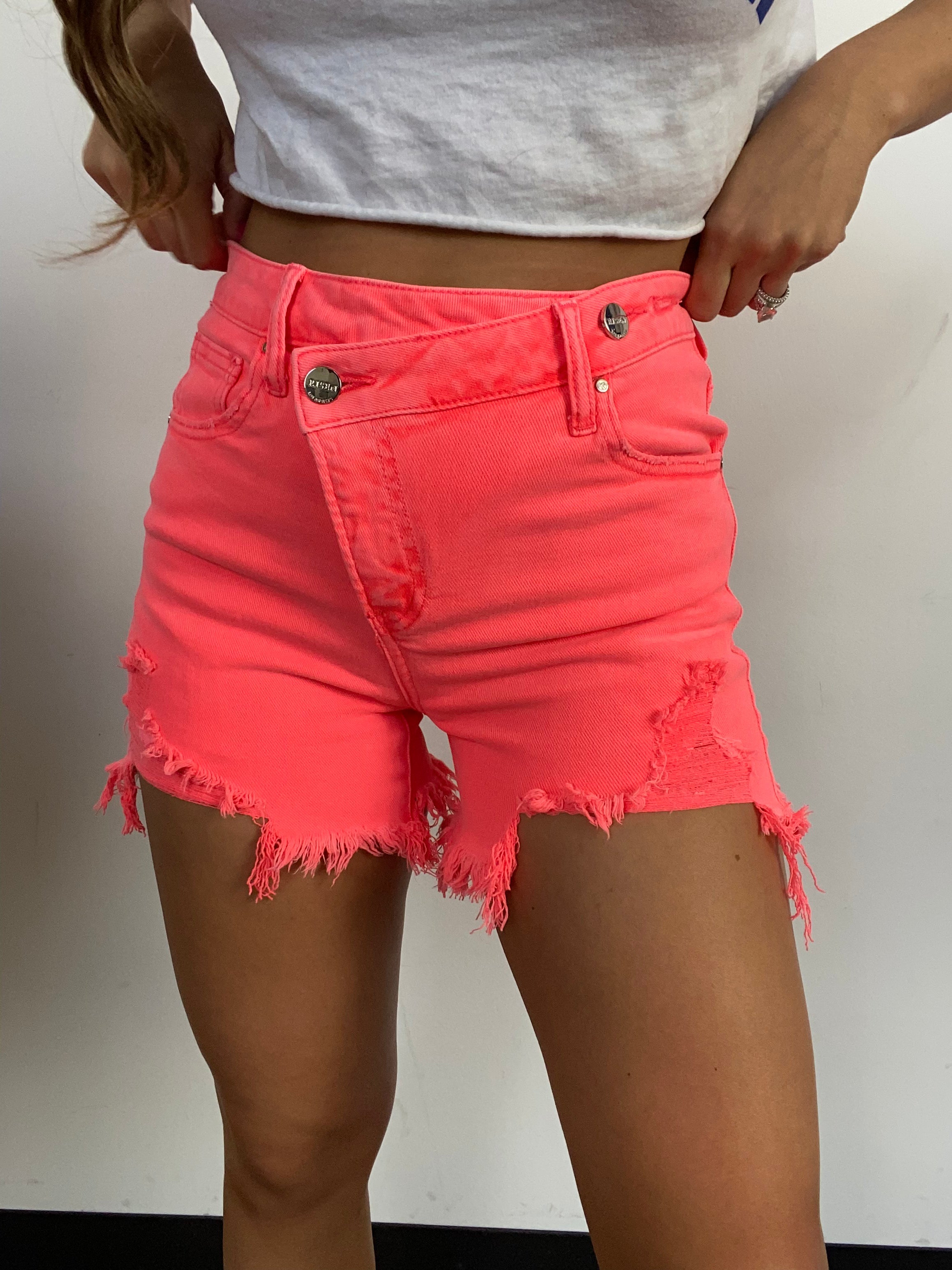 Lindsey Asymmetrical Distressed Denim Shorts – Coral Pink