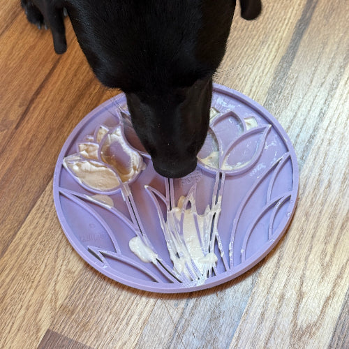Pastel purple SodaPup Tulip Design eMat suction cup lick mat with textured floral pattern for dog and cat enrichment, bath time, and grooming.