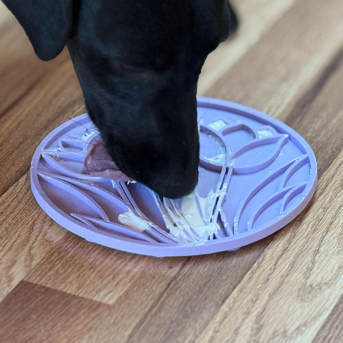 Pastel purple SodaPup Tulip Design eMat suction cup lick mat with textured floral pattern for dog and cat enrichment, bath time, and grooming.