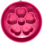 SodaPup Flower eBowl deep slow feeder dog bowl with flower-shaped enrichment ridges, available in pink or purple for medium and large dogs.