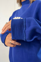 Tilly Jesus Reversible Oversized Mockneck Crew in Blue