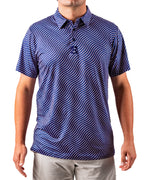 Men’s Wavy Stars & Stripes golf polo by Pins & Aces featuring a navy, red, and white wavy patriotic pattern with short sleeves and an athletic performance fit.