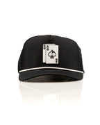 Ace/King Black perforated rope golf hat by Pins & Aces featuring a black poker-inspired design, braided rope accent, adjustable snapback, and built-in magnetic ball marker holder.